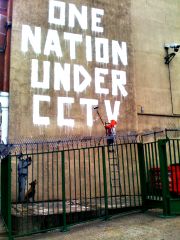 banksy; one nation under cctv picture of Banksy graffiti by Red Label